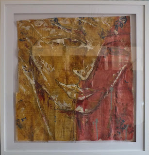 Crushed paper paper portrait boxed in frame with raised glass
