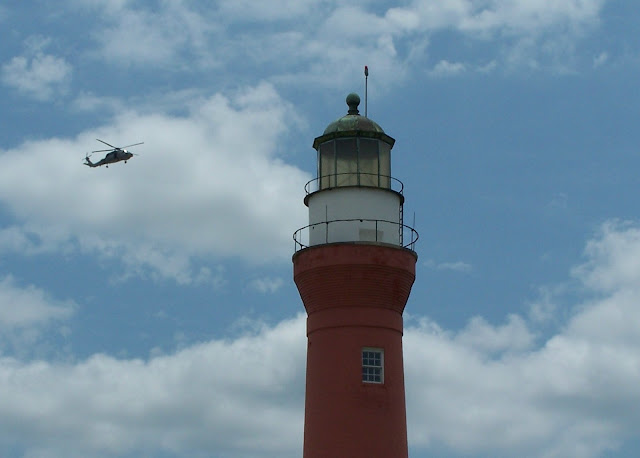 lighthouse and helicopter