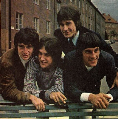 The Kinks 1960 publicity photo in front of row houses