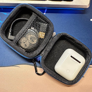 AirPods in case with silicon tips and ~4" Lightning cable