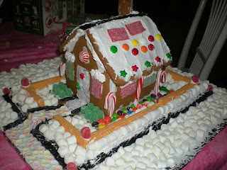 A gingerbread house made using marshmallows