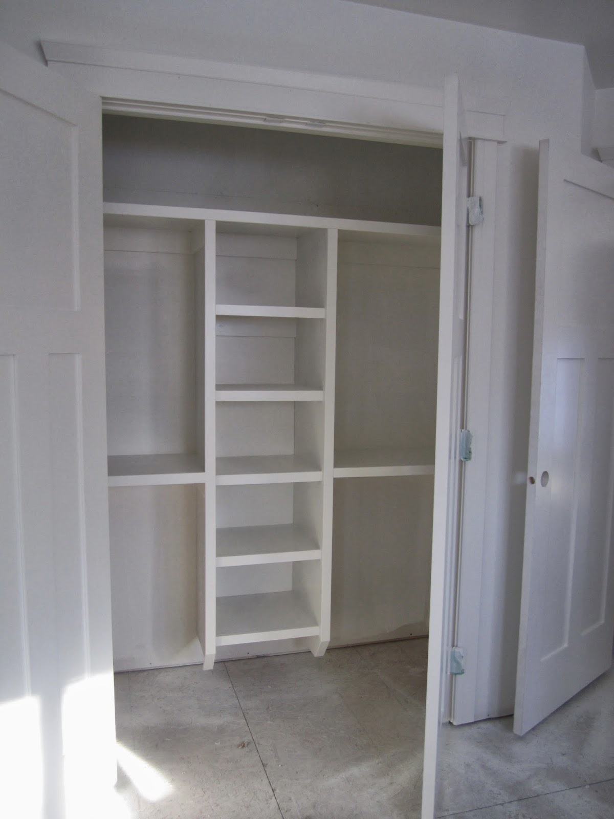 Building an infill in Westmount: Shelves, Trim and Paint 