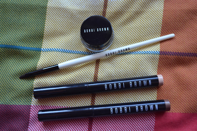 Bobbi Brown eyeliner brush, eyeshadow sticks and gold gel eyeliner