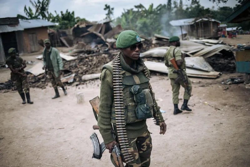 Nigerian Soldier armed with a gun