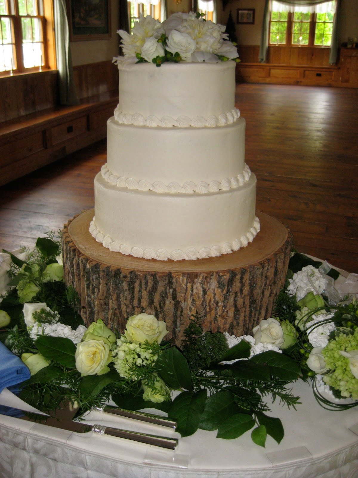 unique wedding cake designs Julie & Jason's beautiful cake on our tree stand. Country Elegance!