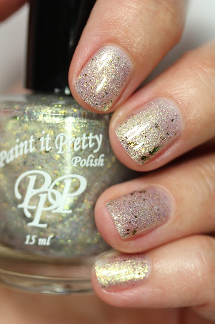 shimmery white nail polish that shifts to green and gold