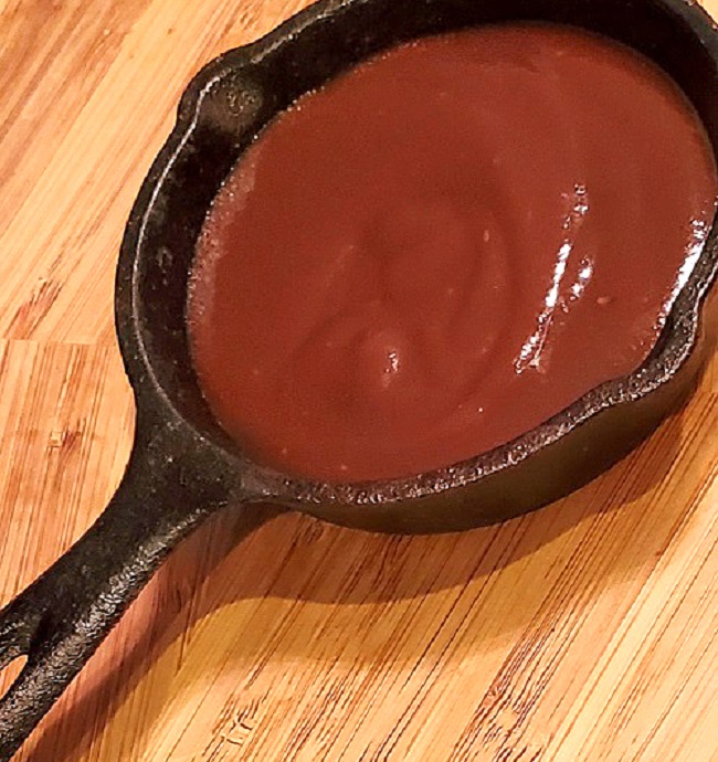 homemade barbecue sauce in a cast iron skillet