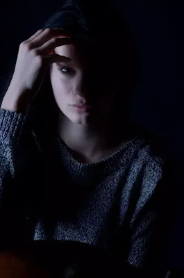An image of a very sad girl whit the dark theme- sad girl dp