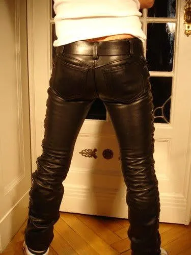 Man from behind wearing tight black leather pants