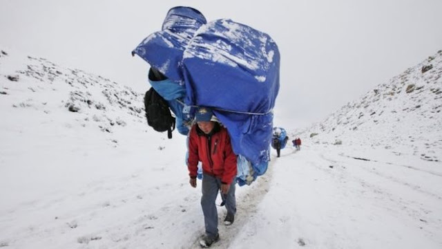 Sherpa and Mount Everest Base Camp