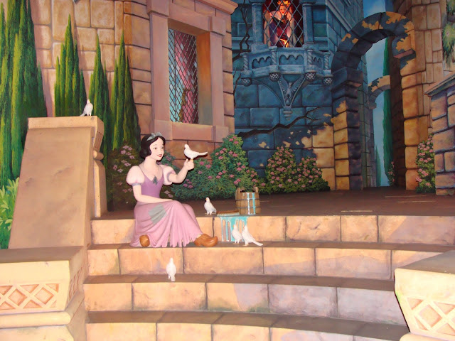 Snow White Sitting on Steps Watched By Evil Queen Snow White's Scary Adventures Magic Kingdom Disney World
