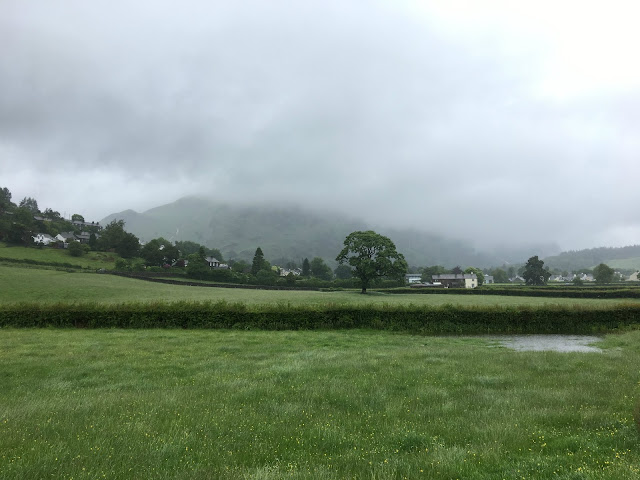 Village, rain clouds, Lake District