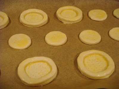 dough cutouts brushed with egg