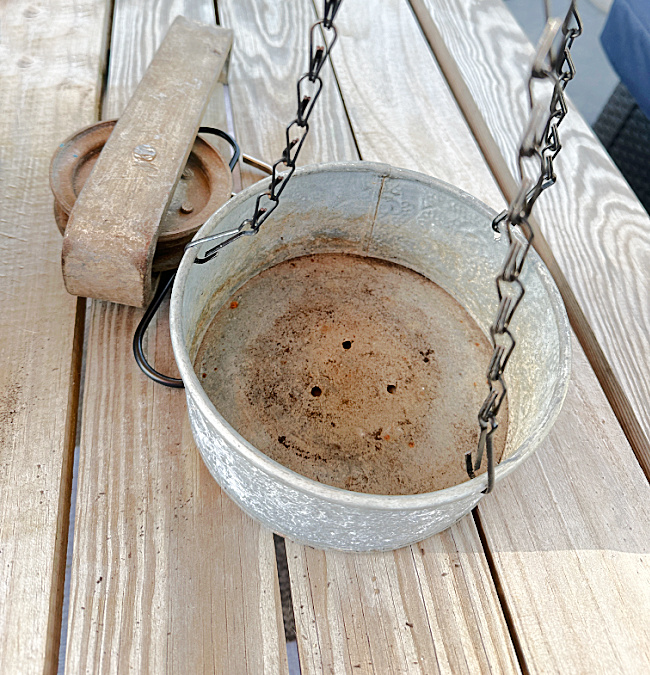 galvanized planter hanging from chains