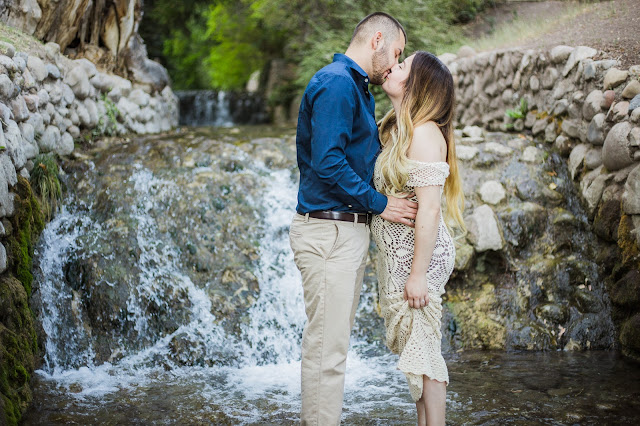 Utah Couples Photographer | Couple in the creek at Memory Grove Park. 