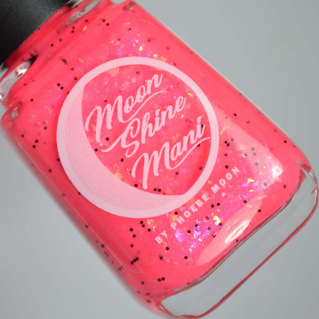 neon pink nail polish with flakies in a bottle