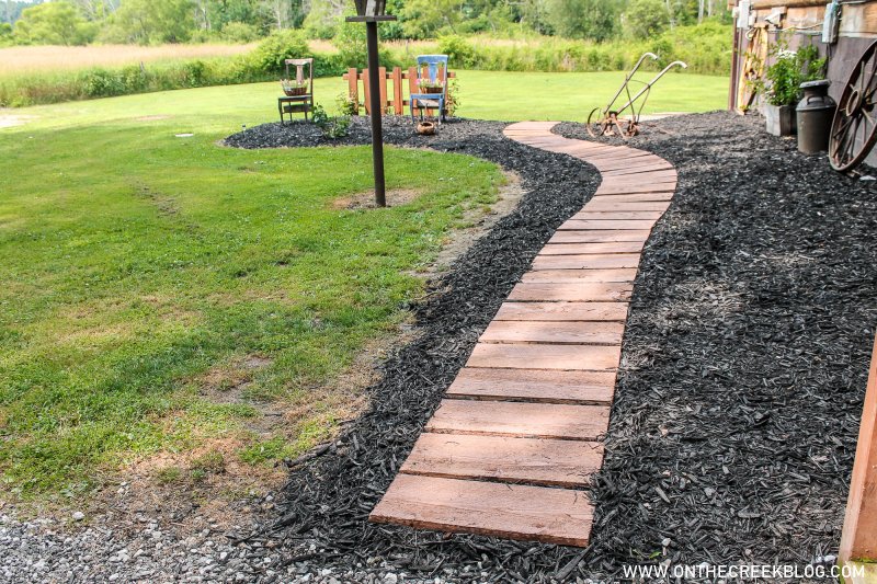 rustic wood pathway made from rough cut lumber | On The Creek Blog // www.onthecreekblog.com