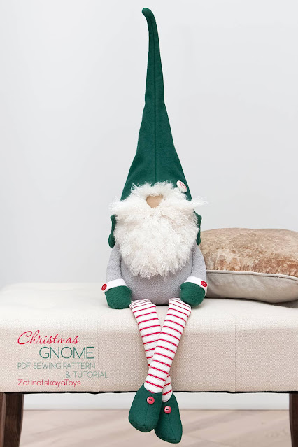 sitting Christmas gnome with hat and long legs by sewing patterns of Zatinatskaya Natalia