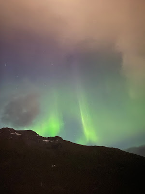 Northern Lights over mountains in Whittier Alaska