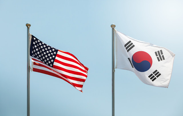 American and South Korean flags