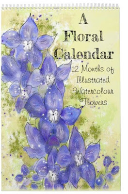 Image shows the fromnt cover of a floral calendar, featuring a blue delphinium sketch