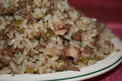 Authentic dirty rice contains chicken livers, but don't fret if you don't like them. You can simply increase the beef or pork and still have a wonderful basic Cajun Rice.