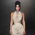 "Pearls of Elegance: Kim Kardashian's Lagerfeld Tribute and Schiaparelli Dress Steal the Show at Met Gala 2021"