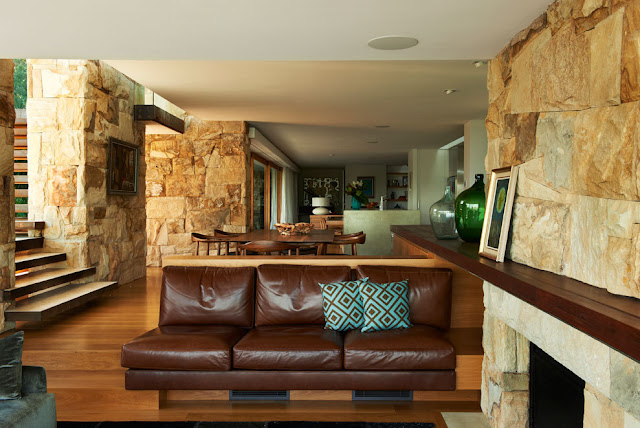 Stone walls and leather sofa in the living room