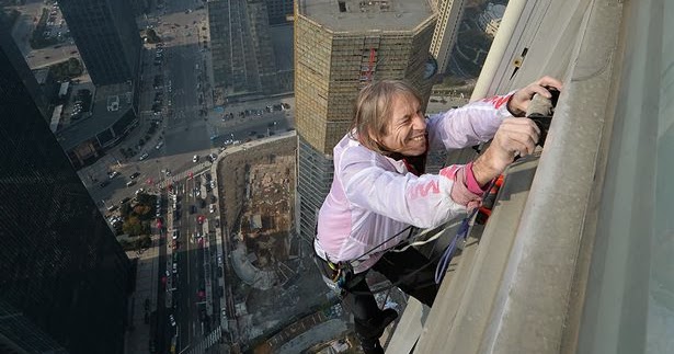 Job opportunities in the Middle East: Alain Robert climbs 1000ft tall