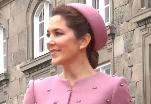 Queen Margrethe, Crown Prince Frederik and Princess Benedikte. Crown Princess Mary wore Claes Iversen coat