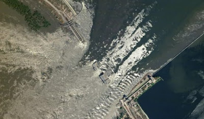 water spilling over the Kakhovka dam