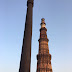An evening in New Delhi : travelling in public transport : Qutub Minar, India Gate, Parathewali Gali and more.