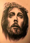 Un très beau tatouage le présentant le visage de jesus. (jesus tatouage visage)