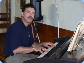 Peter Littlejohn enjoying the Clavinova. Photo courtesy of Dennis Lyons.
