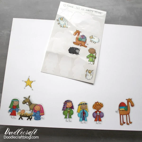 Need an easier version for this little nativity!? This one is just as cute and not nearly as much work. Stick the stickers on the bottom edge of the thick cardstock. Space out the pieces so they can be cut.