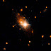 Hubble detects supermassive black hole kicked out of galactic core