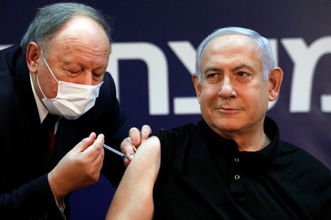 Israel's former Prime Minister Benjamin Netanyahu receiving his COVID-19 immunization