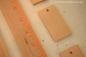 Paint sticks to wooden tags