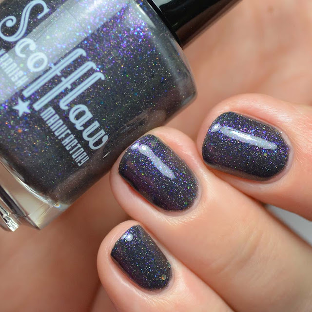 charcoal nail polish with purple and holo glitter