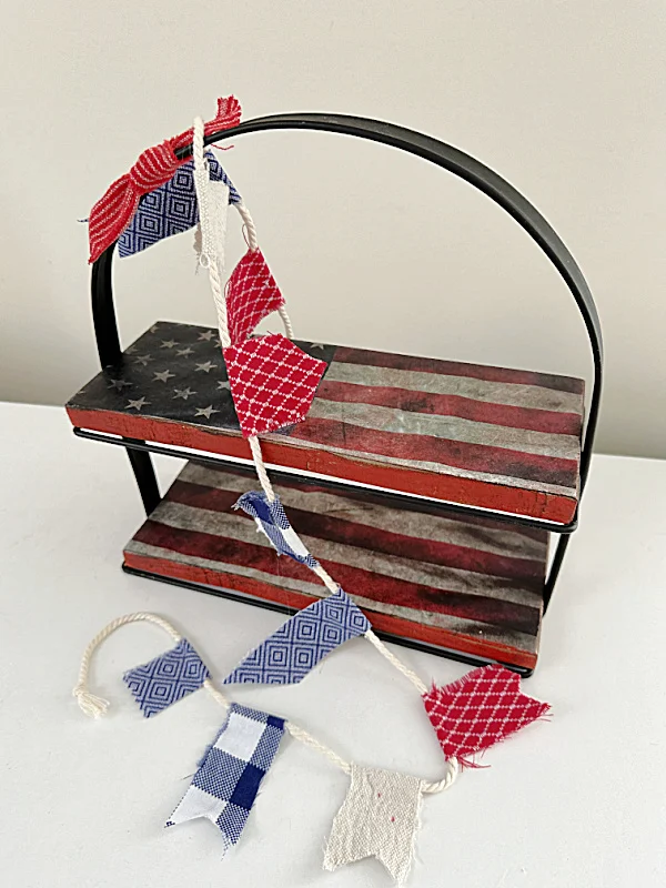 flag tiered tray with red white and blue banner