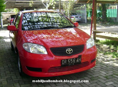 Toyota Limo eks taksi Blue bird group Lombok Taksi warna merah
