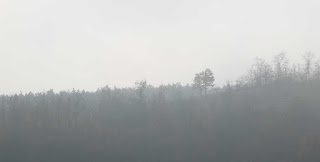 Foggy distant ridge