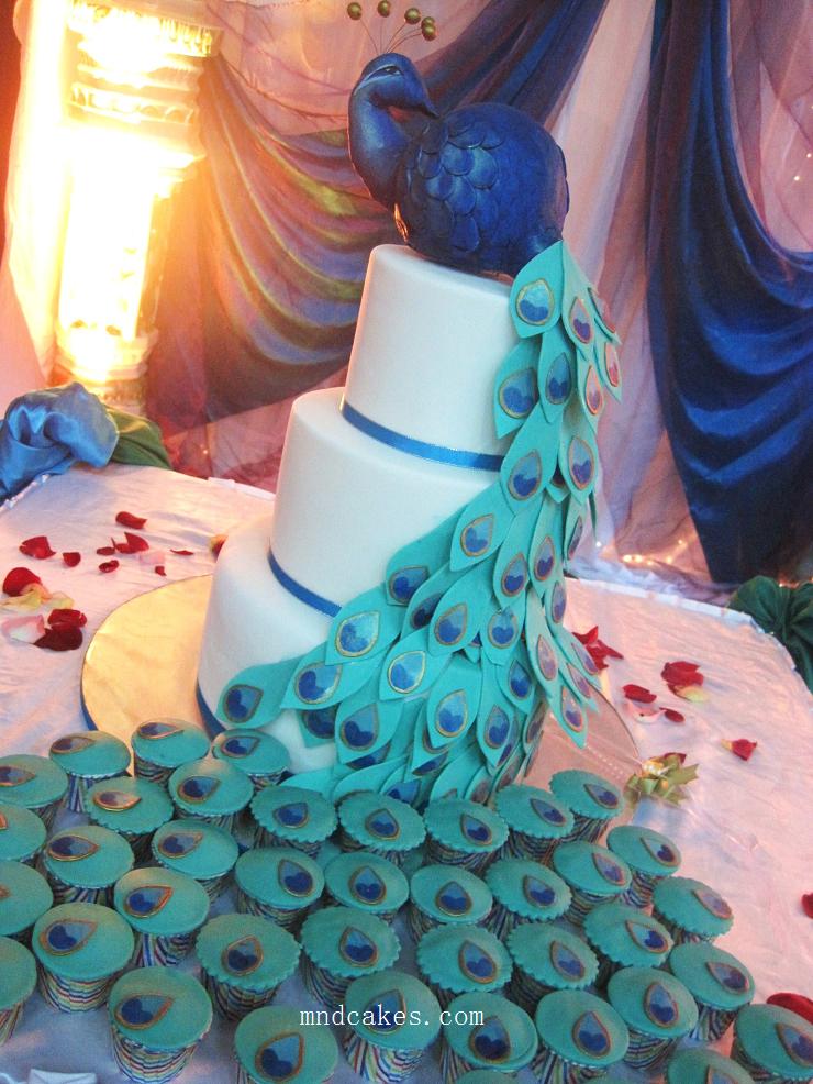 These cakes include a peacock themed wedding cake calla lily wedding cake 