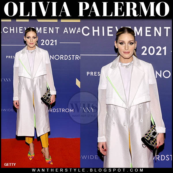 Olivia Palermo in wihte mesh sleeve coat and rainbow pumps