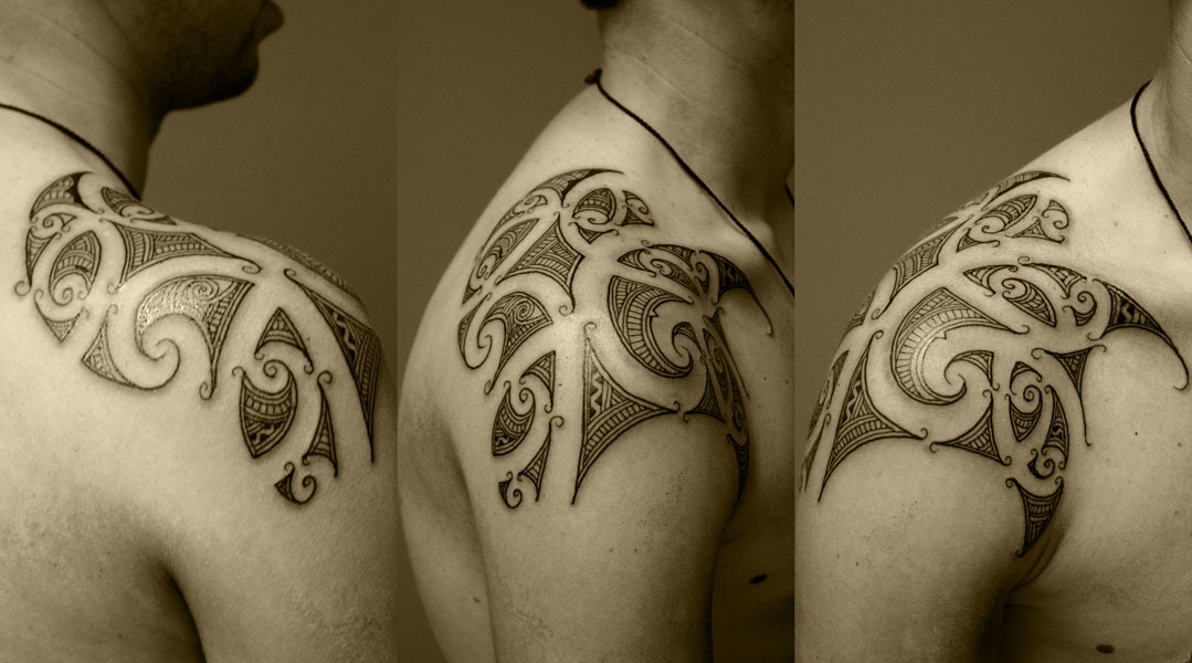 tribal tattoos on shoulder and chest. shoulder tribal tattoos.