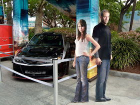 Fast & Furious stars Jordanna Brewster and Paul Walker and car