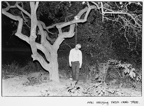 Andrew Savulich - NYC reportage photo of man hanged on tree