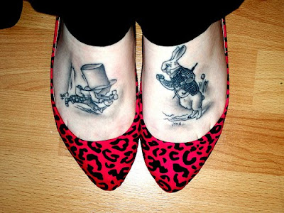 tattoos on feet. in Wonderland tattoos.