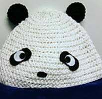 http://www.ravelry.com/patterns/library/panda-hat-4