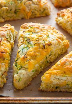 My favorite savory scone recipe loaded with sharp cheddar cheese and shredded zucchini! Who knew veggies could taste this good!?